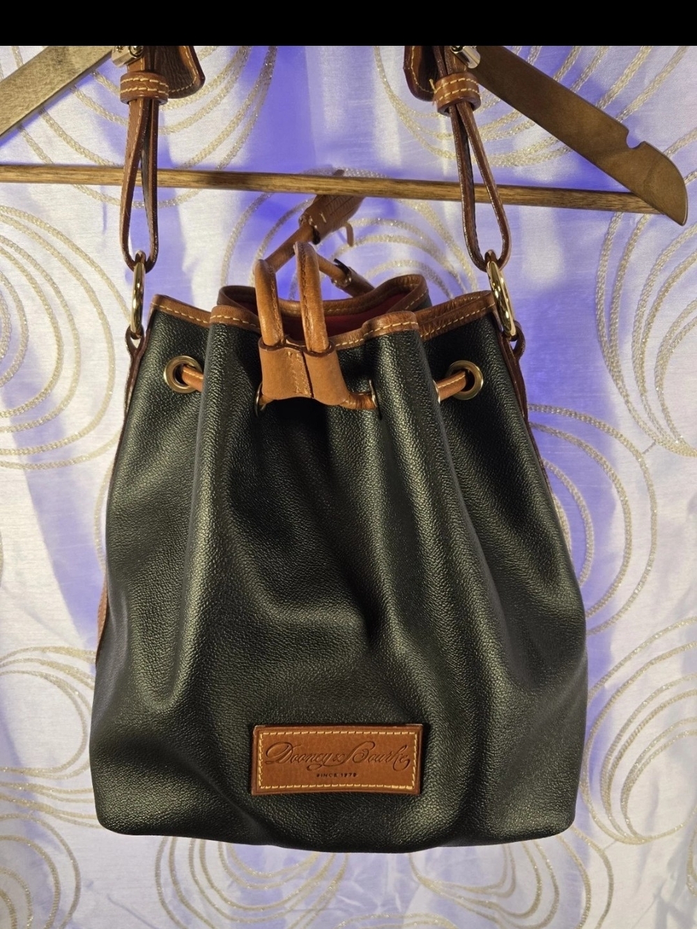 Dooney & Bourke Black Leather Drawstring Bucket Bag with Brown Trim